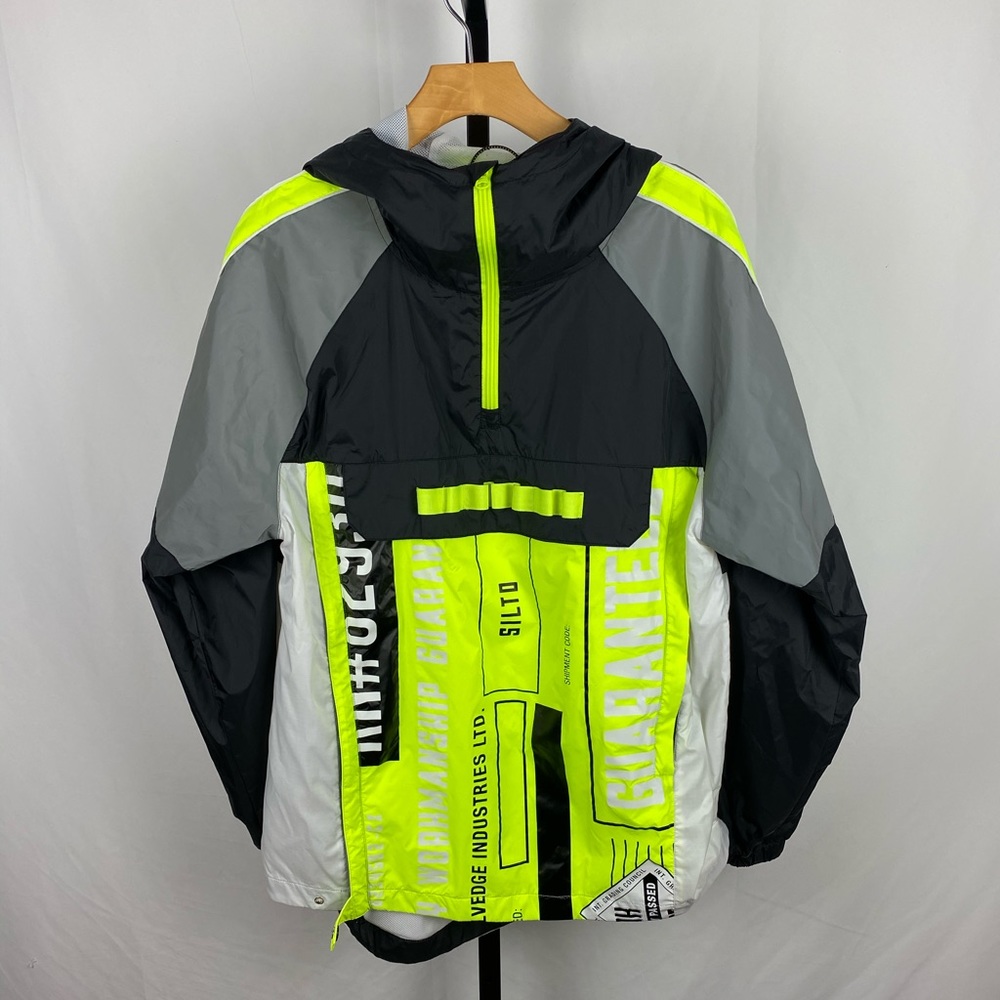 Electric lime reflective windbreaker